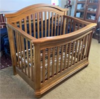 Bed - converts from crib to toddler to full size