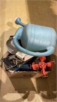 Great outdoor box. Contains a large watering can,