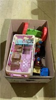 Box of toys includes lots of plastic tools, a