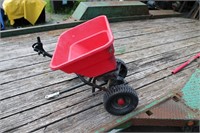 Spreader for lawn tractor