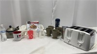 Toastmaster toaster, coffee cups chicken rack,