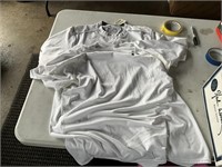 2 white Under Armor shirts sz medium and large