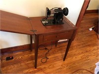 Singer Sewing Machine w/ Cabinet