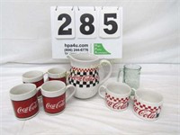 Coca Cola Pitcher & (7) Various Coca Cola Mugs