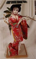 17 " Geisha doll on 7 " x 6" wood platform