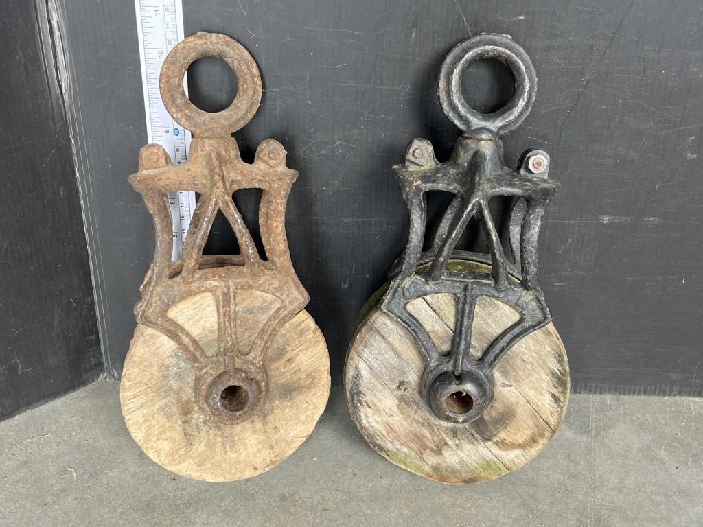 2 wood pulleys