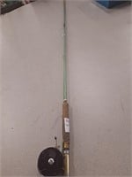 Vintage fishing rod with oren-o-matic south bend