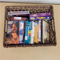Basket with Books and VHS Tapes