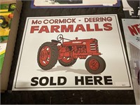 McCormick deering farmalls sold here met sign