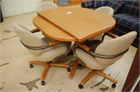 Kitchen Table W/ 4 Rolling Chairs