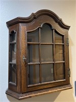 Wooden hanging cabinet with key. Measures 26WX