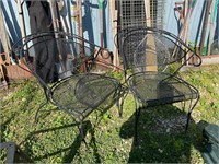 Two wrought iron chairs