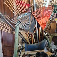 Barrel of hand rakes and tools