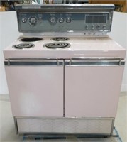 Vintage stove pink color.