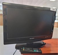 SHARP 19IN TV ON STAND W/ REMOTE