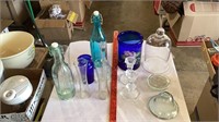 Glass vases, candle holders, glass bottles,