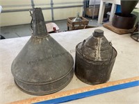 Old metal can and funnel