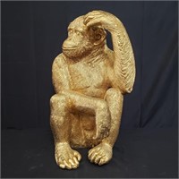 Life-size fiberglass monkey