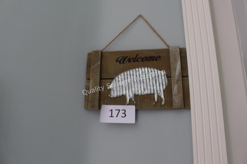 “welcome” wooden sign
