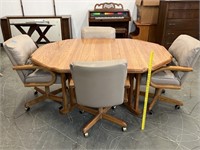 Oak Table W/ 4 Leather Rolling Arm Chairs