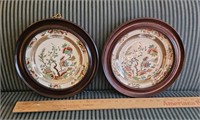 Pair of Walnut framed oriental porcelain plates