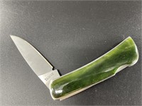 Folding knife with Kobuk jade scales, 6.5" long wh