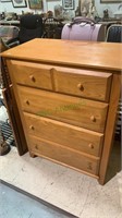 Bassett Furniture dresser with four drawers.
