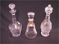 Three crystal decanters from 10 1/2" to 13 1/2",