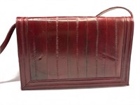 Vintage red eelskin purse, 
7” h. x 11” w.