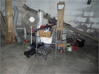Assortment along back row of basement - heater,