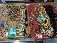 2 trays Costume jewelry. Preview a must
