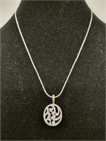 Encrusted style sterling silver pendant necklace.
