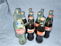 11 old Coke Coca-Cola bottles. 2 say Muncie, IN 8