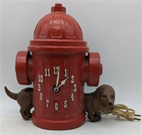 (M) Clock of fire hydrant and dachshund.  11"