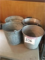 Four steel and galvanized buckets