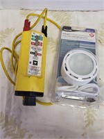 Voltage tester and light