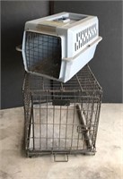 Lot of dog and cat carriers. Small dog crate and