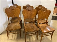 6 beautiful wood chairs.
