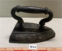 ANTIQUE SAD IRON WITH COMPANY LETTERING