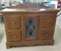 Wooden cabinet with glass insert