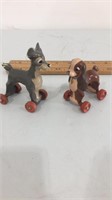 Antique lady and the tramp rolling toys.  Made in