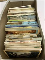 Shoebox of vintage postcards