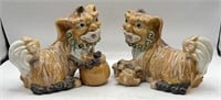 Pair of ceramic foo dog statues