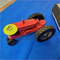 VINTAGE RED CAST IRON TRACTOR