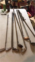 Vintage wooden Handel golf clubs, fishing pole,