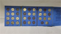 23 silver ben franklin half dollars in book