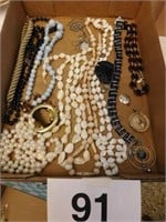 flat of necklaces and pendants