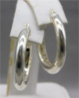 Sterling Silver hoop earrings.