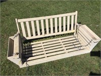 Old wooden porch swing-side magazine holders