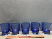 FIVE BLUE COLORED DRINKING GLASSES